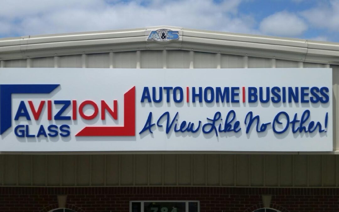 Dimensional PVC letters on a flanged aluminum panel